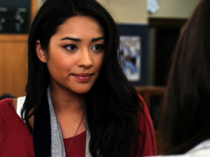 Shay Mitchell as Emily Fields, a competitive swimmer who soon best ...