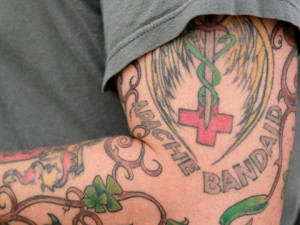 Justin Sullivan/Getty Images A tattoo is seen on the arm of a U.S ...