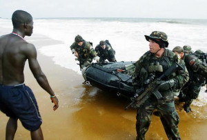 Navy Seals land on a beach in Monrovia, Liberia. A fatal French ...