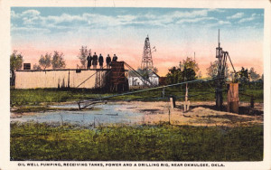 Published by Curt Teich, this white border postcard shows an oil rig ...