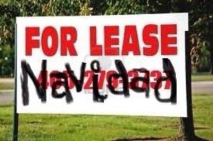 ... like this funny yard sign. Merry Christmas, or… For Lease Navidad