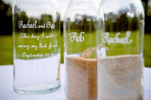 ... above, a bottle with the joined sands that has a quote or vow on it