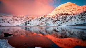 Winter lake snow capped mountains the red glow beauty Wallpaper.jpg