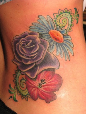 Tattoos of different flowers will evoke emotion
