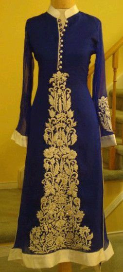 Royal blue and gold, with a collar neckand full sleeves. Will make you ...