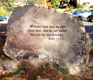 boulder contains a Bible verse that was sandblasted into it in the ...