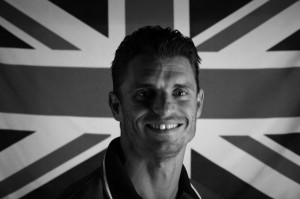 beautiful teen girl in black top holding her pigtails