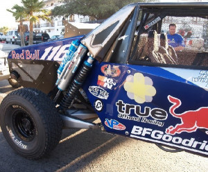 with travis travis showing a 1 bill autographed by travis pastrana