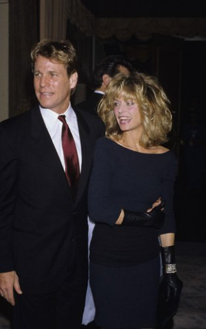 Ryan O'Neal and Farrah Fawcett circa 1980s