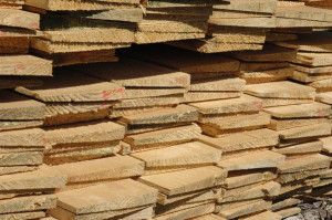 stock at the yard a selection of timber products, sleepers, gates, log ...