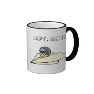 Humorous paper airplane and pilot coffee mug