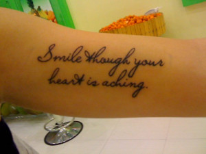 Smile though your heart is aching tattoo design