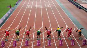 the start the nine fastest runners in the world shoot out of their ...