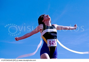 runner_crossing_the_finish_line_victoriously_412PCN02445.jpg