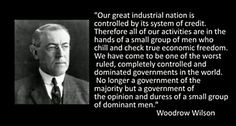 Woodrow Wilson signed into law the Federal Reserve, which is ...
