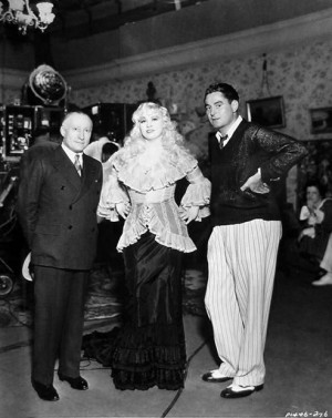 Paramount head Adolph Zukor poses with Mae West and director Leo ...