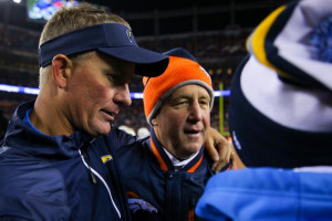 Chargers is congratulated by Head Coach John Fox of the Denver Broncos ...
