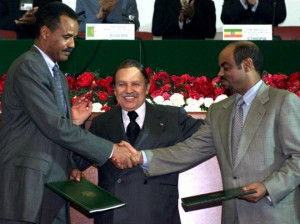 Eritrean president Isaias Afwerki shaking hands of former Ethiopian
