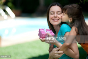 Royalty-free Image: Mother receiving a gift from her daughter