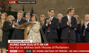 Gordon Brown, Ed Miliband and David Cameron applauding Aung San Suu ...