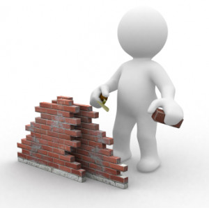 cartoon figure builds a foundation wall from bricks