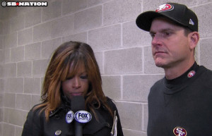 Jim Harbaugh & Pam Oliver are having a very serious postgame interview