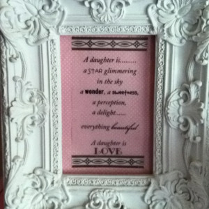 Ceramic frame with vellum quote and scrapbook paper and ribbon border.