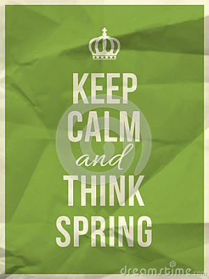 Keep calm and think spring quote on green crumpled paper texture.