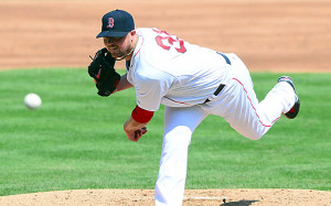 Jon Lester and the Red Sox have put extension talks on hold. (USATSI)