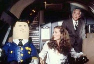 Elaine Dickinson, and Leslie Nielsen as Dr. Alan Rumack in the cockpit ...