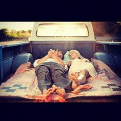 Laying in the bed of a pickup truck. More