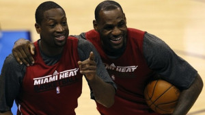 Miami Heat's LeBron James and Dwyane Wade share a laugh during a team ...
