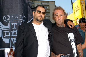 Original Z-Boys skater Jay Adams (R) and guest arrive at the Premiere ...