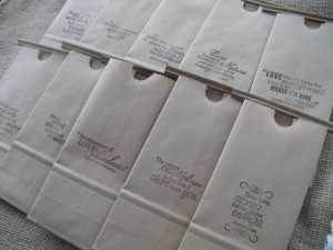 ... quotes rubber-stamped onto kraft paper lunch bags. Super cute favors