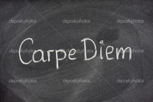 Carpe Diem phrase on blackboard - Stock Image