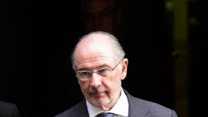 ... Rodrigo Rato leaves a hearing in Madrid on October 16, 2014 (AFP Photo