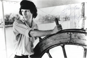 John Hartford posing against the wheel in the Julia Belle Swain pilot ...