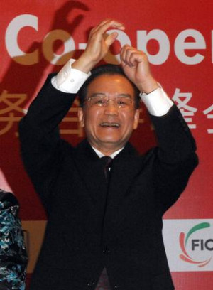 Chinese Premier Wen Jiabao gestures as he arrives at the India-China ...