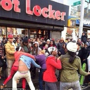 Sneaker freaks: A group of girls brawls in the crowd massed outside a ...