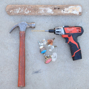 Plank of wood, drill with ¼” bit, knobs (found at Anthropologie for ...