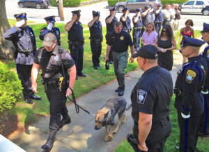 Kaiser was met by a silent, respectful group of his fellow officers ...