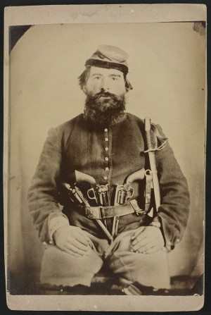 Blue, Union cavalry soldier, armed to the teeth. ca. 1861 ...