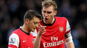 Mesut Ozil was given a ticking off by Per Mertesacker after the final ...