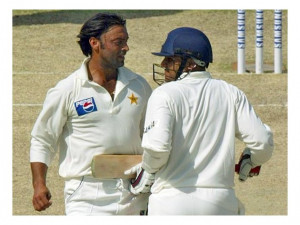 Virender Sehwag and Shoaib Akhtar of Pakistan run into each other ...