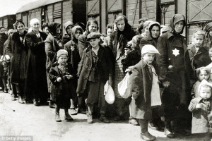 Jews wearing the star emblem, arrive in Auschwitz, in German-occupied ...