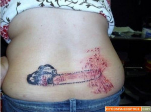 Untitled 500x372 Chainsaw Tattoo. Complete with stretch marks!