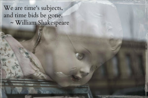 Cracked doll in window with Shakespeare quote