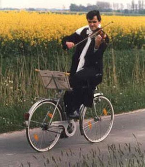 10. Cycling Backward With A Violin