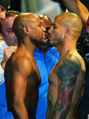 Photos: Floyd Mayweather, Miguel Cotto Tense Weigh-In