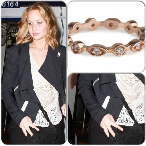 Jennifer Lawrence wears Kara Ackermanstacking ring.